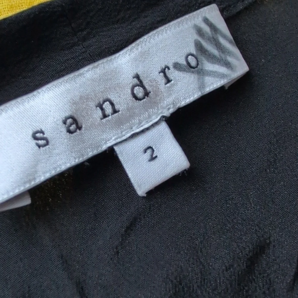 Sandro Paris black Silk blouse , pleated front and sleeves.